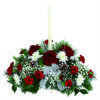 Centrotavola natalizio con rose fiori e candela