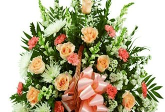 cesto funebre di fiori arancio